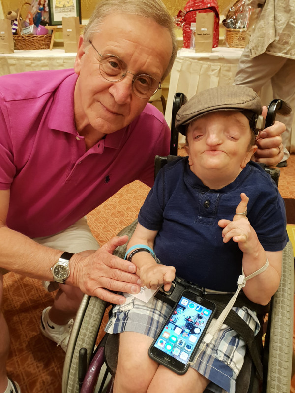 Author Harry Bird and friend at a Children's Craniofacial Association event